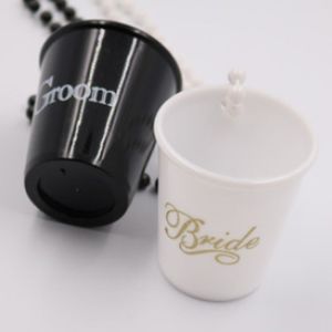 Set of 2 Black and White ‘Bride’ and ‘Groom’ Shot Glasses